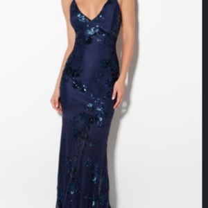 Floor length midnight blue mesh dress with sequin appliqué